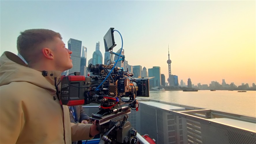 Cinema camera setup on the Bund at sunset in Shanghai